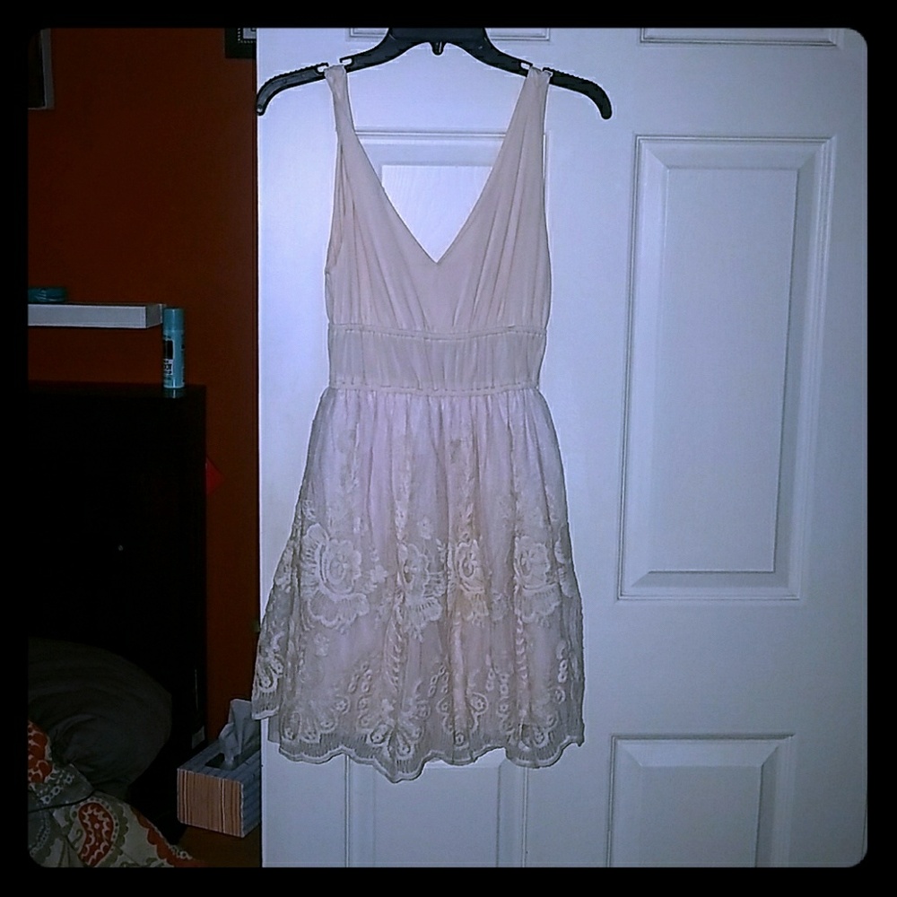 A lacy off white dress